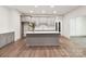 Basement kitchenette featuring grey cabinets, quartz countertops, and a modern design at 416 Plantation Way # 3, Mount Gilead, NC 27306