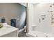 Bathroom featuring new tile shower, vanity and bronze fixtures at 416 Plantation Way # 3, Mount Gilead, NC 27306