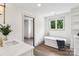 Spa-like bathroom showcasing a freestanding tub, vanity with elegant fixtures, and wood-look floors at 416 Plantation Way # 3, Mount Gilead, NC 27306
