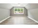 Bonus room features a ceiling fan and a large window with natural light at 416 Plantation Way # 3, Mount Gilead, NC 27306
