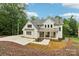 Stunning two-story home with a modern farmhouse design and manicured landscaping at 416 Plantation Way # 3, Mount Gilead, NC 27306