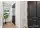 Hallway with tiled floor and dark doors at 416 Plantation Way # 3, Mount Gilead, NC 27306