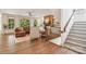 Comfortable living room with a fireplace, built-in shelves, and large windows at 416 Plantation Way # 3, Mount Gilead, NC 27306