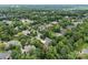 Aerial view of the neighborhood surrounded by lush trees at 4263 Rambling Rose Ln # 23, Rock Hill, SC 29732