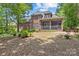 Spacious backyard features a screened porch and landscaping at 4263 Rambling Rose Ln # 23, Rock Hill, SC 29732