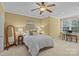 Inviting bedroom offers a bed, a ceiling fan, and natural light from a window at 4263 Rambling Rose Ln # 23, Rock Hill, SC 29732