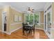 Dining room with natural light from large windows and hardwood flooring at 4263 Rambling Rose Ln # 23, Rock Hill, SC 29732