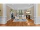 Bright living room with fireplace, hardwood floors, and large windows at 4263 Rambling Rose Ln # 23, Rock Hill, SC 29732