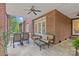 Covered patio with brick features a dining area and seating at 4263 Rambling Rose Ln # 23, Rock Hill, SC 29732