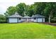 Expansive backyard with lush green lawn and manicured landscaping at 4275 Herman Sipe Rd, Conover, NC 28613