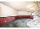 Spacious basement area with unique paneling and a stone accent wall at 4275 Herman Sipe Rd, Conover, NC 28613
