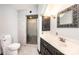 Renovated bathroom with black accents, tiled walk-in shower, and a marble countertop at 4275 Herman Sipe Rd, Conover, NC 28613