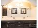 Bathroom featuring and sinks, black cabinets and elegant lighting at 4275 Herman Sipe Rd, Conover, NC 28613