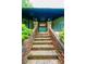 Inviting front entrance with brick steps, lantern-style lighting, and well-maintained landscaping at 4275 Herman Sipe Rd, Conover, NC 28613
