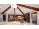 Large kitchen with a skylight, wood beams, tiled floors, stainless steel appliances, and ample counter space at 4275 Herman Sipe Rd, Conover, NC 28613
