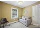 Cozy room showcasing neutral paint and carpet, a couch, and natural light at 4824 Waxhaw Farms Rd, Waxhaw, NC 28173
