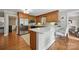 Modern kitchen featuring stainless steel appliances, light colored countertops and wooden cabinetry at 4824 Waxhaw Farms Rd, Waxhaw, NC 28173