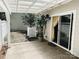 Private back patio featuring a covered pergola and sliding glass door access to the home at 5017 Celeste Ct, Charlotte, NC 27609