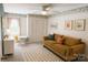 Playful bedroom features colorful accents, a cozy sofa, and a cheerful atmosphere at 5017 Celeste Ct, Charlotte, NC 27609