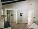 Bright bedroom featuring a walk in closet and hardwood floors at 5017 Celeste Ct, Charlotte, NC 27609