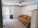 Bedroom featuring bright walls, carpet floors, and a window with natural light at 5017 Celeste Ct, Charlotte, NC 27609
