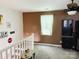 Bright bonus room featuring carpet floors, neutral paint, and a window with natural light at 5017 Celeste Ct, Charlotte, NC 27609