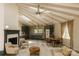 Spacious living room features a fireplace, open kitchen, and vaulted ceilings at 5017 Celeste Ct, Charlotte, NC 27609