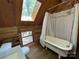 Bathroom features a clawfoot tub, skylight and rustic wood-paneled walls at 5109 Walnut Grove Ln, Charlotte, NC 28227