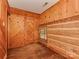 This is a bedroom with a wooden floor and walls and a window at 5109 Walnut Grove Ln, Charlotte, NC 28227