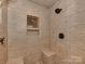 This bathroom features a shower with stylish tile and bronze fixtures at 5109 Walnut Grove Ln, Charlotte, NC 28227