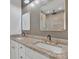 Luxurious bathroom featuring double sinks, granite countertops, and modern fixtures at 512 North Mulberry St, Cherryville, NC 28021