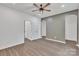 Spacious bedroom with hardwood floors, ceiling fan, and ample closet space at 512 North Mulberry St, Cherryville, NC 28021