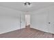 This bedroom features sleek wood-look floors and a convenient closet at 512 North Mulberry St, Cherryville, NC 28021