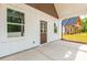 Covered back patio features stylish window and exterior door at 512 North Mulberry St, Cherryville, NC 28021