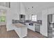 Modern eat-in kitchen features stainless appliances, stylish backsplash, and lots of storage at 512 North Mulberry St, Cherryville, NC 28021