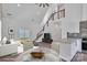 Open concept living space with eat-in kitchen, modern furniture, and sliding glass doors at 512 North Mulberry St, Cherryville, NC 28021