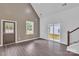 Spacious living area featuring hardwood floors, and sliding glass doors to the backyard at 512 North Mulberry St, Cherryville, NC 28021