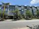 Modern condominium building with a well-maintained facade and landscaping at 514 W 10Th St # 403, Charlotte, NC 28202