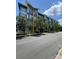 Contemporary condominium building with landscaped frontage and mature trees at 514 W 10Th St # 403, Charlotte, NC 28202