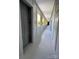 Well-lit condo hallway with elevator access and bright yellow window accents at 514 W 10Th St # 403, Charlotte, NC 28202