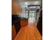 Bright kitchen featuring stainless sink, black appliances and hardwood floors at 514 W 10Th St # 403, Charlotte, NC 28202