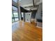 Open living space with hardwood flooring, neutral walls and industrial style elements at 514 W 10Th St # 403, Charlotte, NC 28202