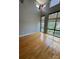 Bright living room with hardwood floors and views from large windows and high ceilings at 514 W 10Th St # 403, Charlotte, NC 28202