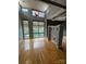 Open living room with high ceilings, clerestory windows, hardwood floors and modern lighting at 514 W 10Th St # 403, Charlotte, NC 28202