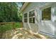 Wood deck with a door leading into the home at 54 Reed Ne St, Concord, NC 28025