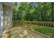 New wood deck offers a great view of the back yard and tree line at 54 Reed Ne St, Concord, NC 28025