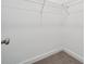 Walk-in closet with wire shelving, providing ample storage space at 54 Reed Ne St, Concord, NC 28025