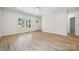 Inviting living area with large windows and natural light and an open concept design at 54 Reed Ne St, Concord, NC 28025