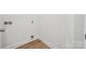 Bright room with wood-look vinyl flooring and a utility hookup at 54 Reed Ne St, Concord, NC 28025