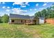Backyard featuring a wooden deck, a screened porch, and a lawn at 6249 Hayden Dr, Hickory, NC 28601